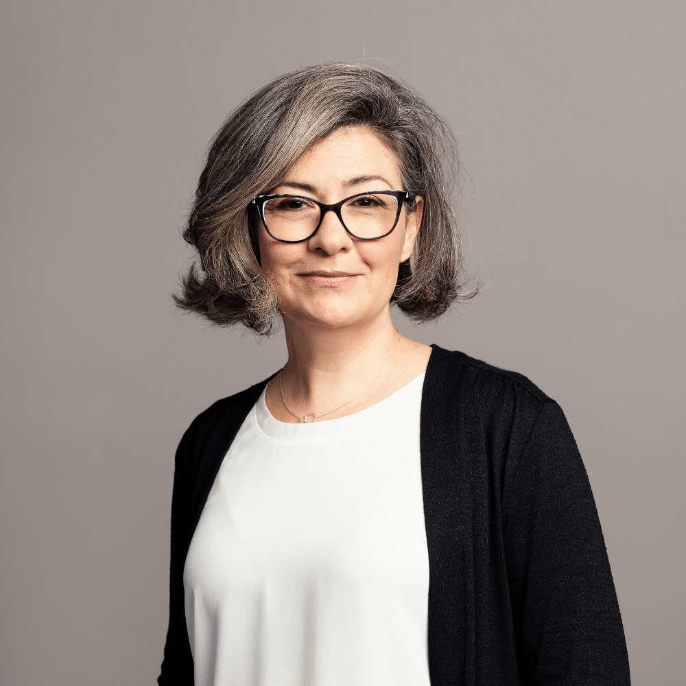 caucasian-woman-facing-camera-smiling